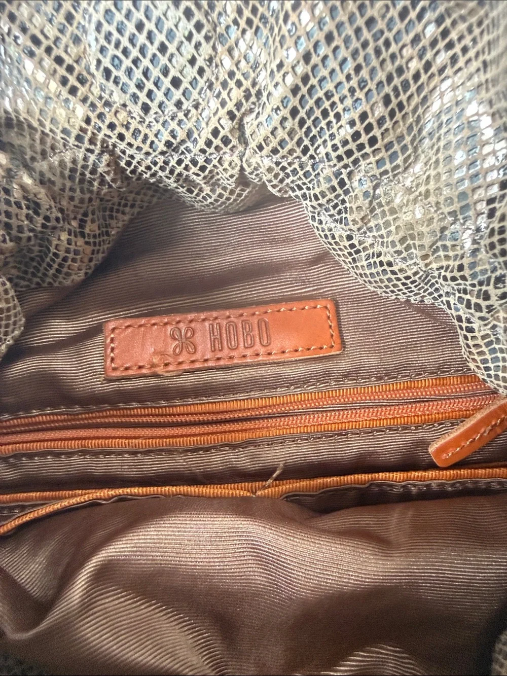HOBO Brown Metallic Drawstring Shoulder Bag with Gold Accents